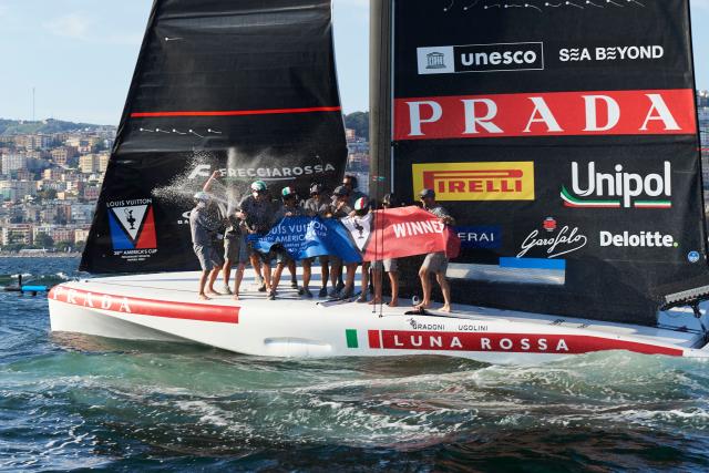 Challenger Italy's Luna Rossa 1 Principal Team celebrates after winning the the final match of the Louis Vuitton 38th America's Cup Preliminary race event in Naples, on September 27, 2026. (Photo by ELIANO IMPERATO and Eliano Imperato / AFP)
