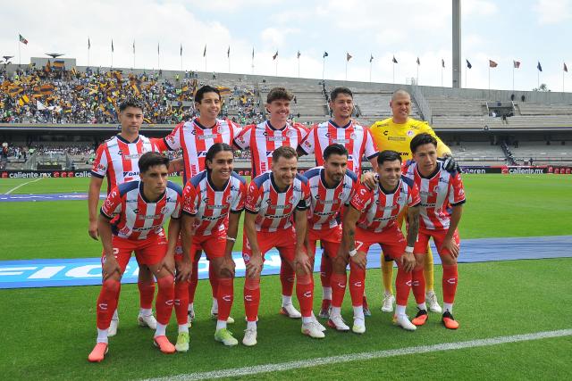 Players of San Luis pose for a picture ahead of the Liga MX Apertura tournament football match between Pumas and San Luis at the Olimpico Universitario stadium in Mexico City on September 27, 2026. (Photo by Victor CRUZ / AFP)