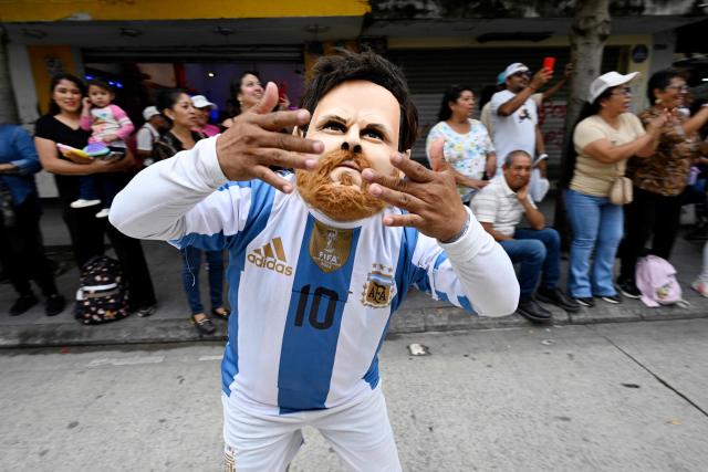 A dancer wearing a costume depicting Argentine football player Lionel Messi performs during a "Convite," a traditional dance festival in Guatemala City on September 27, 2026. (Photo by Johan ORDONEZ / AFP)