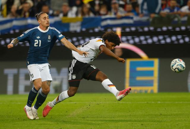 Germany's midfielder #19 Karim Adeyemi tries to score during the UEFA Nations League Group A2 between Germany and Greece in Augsburg, southern Germany on September 27, 2026. (Photo by Michaela STACHE / AFP)