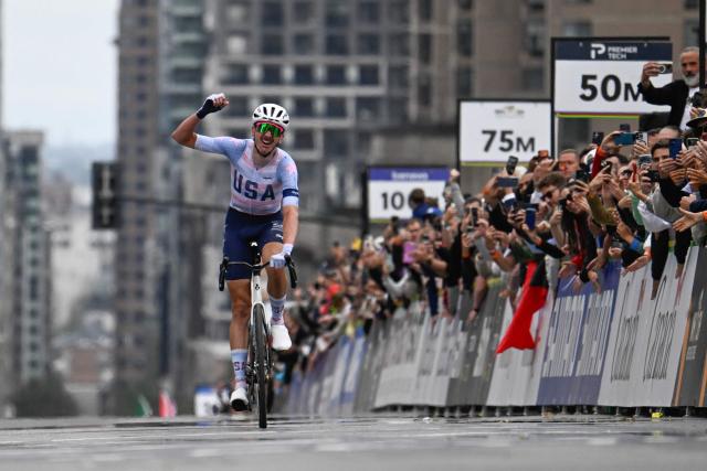 The United States' Brandon McNulty celebrates winning the Men Elite Road Race during the 2026 Union Cycliste Internationale (UCI) Road World Championships in Montreal, Quebec, on September 27, 2026. (Photo by Andrej Ivanov / AFP)