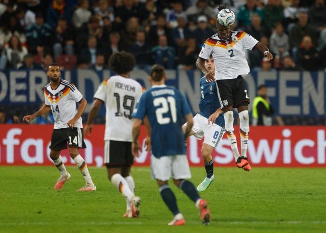 Germany's defender #02 Yann Aurel Bisseck heads the ball during the UEFA Nations League Group A2 between Germany and Greece in Augsburg, southern Germany on September 27, 2026. (Photo by Michaela STACHE / AFP)