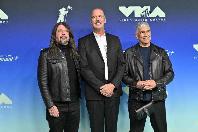 (L-R) US musicians Dave Grohl, Krist Novoselic and Pat Smear attend the MTV Video Music Awards at the Peacock Theater in Los Angeles, California on September 27, 2026. (Photo by LISA O'CONNOR / AFP)