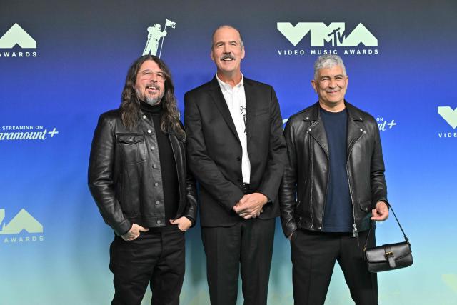 (L-R) US musicians Dave Grohl, Krist Novoselic and Pat Smear attend the MTV Video Music Awards at the Peacock Theater in Los Angeles, California on September 27, 2026. (Photo by LISA O'CONNOR / AFP)