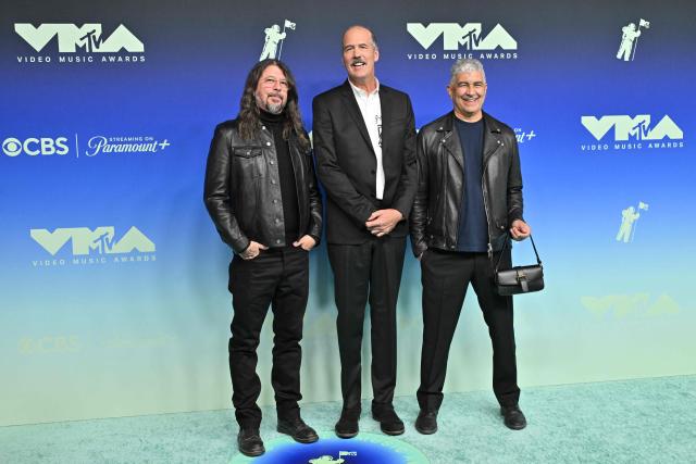 (L-R) US musicians Dave Grohl, Krist Novoselic and Pat Smear attend the MTV Video Music Awards at the Peacock Theater in Los Angeles, California on September 27, 2026. (Photo by LISA O'CONNOR / AFP)
