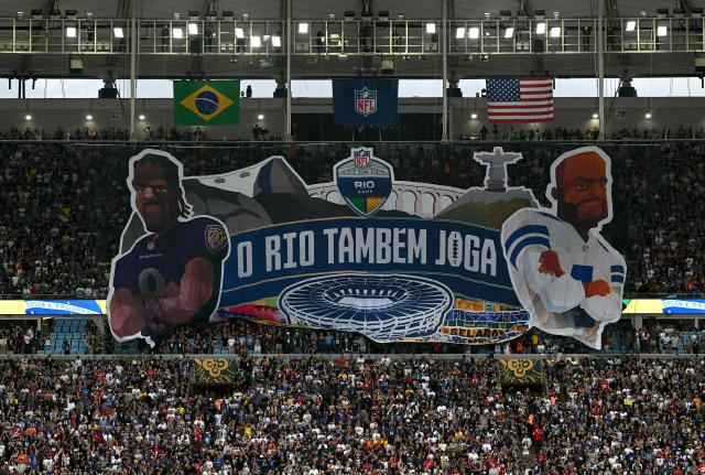 Fans display a tifo during the NFL match between the Dallas Cowboys and the Baltimore Ravens at the Maracana Stadium in Rio de Janeiro, Brazil, on September 27, 2026. (Photo by MAURO PIMENTEL / AFP)