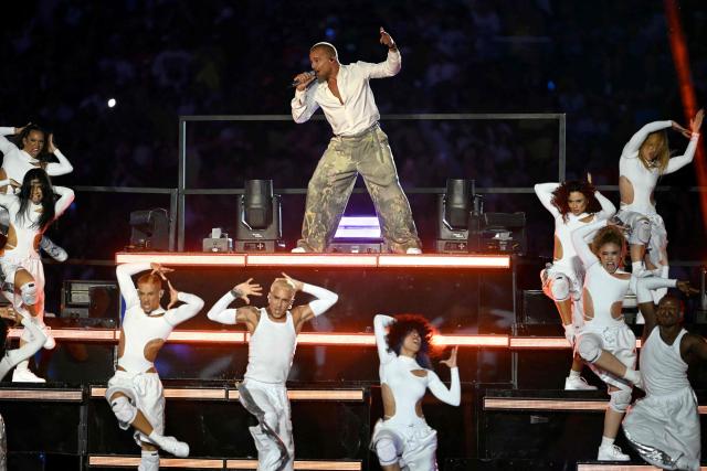 Puerto Rican singer Ricky Martin performs during half time of the NFL match between the Dallas Cowboys and the Baltimore Ravens at the Maracana Stadium in Rio de Janeiro, Brazil, on September 27, 2026. (Photo by MAURO PIMENTEL / AFP)