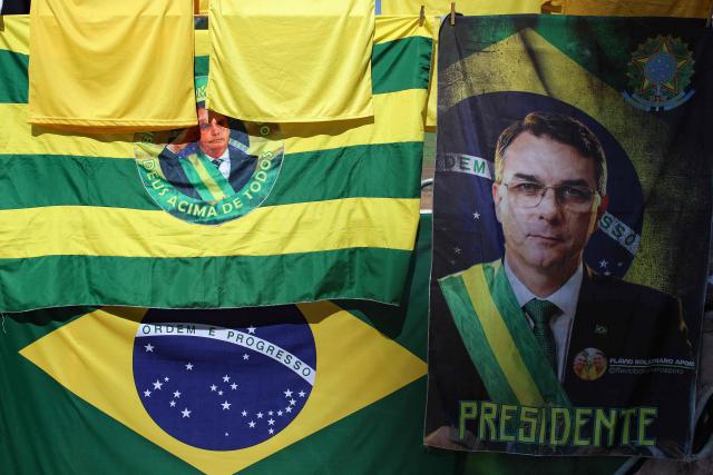 Merchandising of Brazilian right-wing presidential candidate Flavio Bolsonaro is pictured ahead of a campaign rally in Goiania, Brazil, on September 27, 2026. Brazil will hold presidential election on October 4, 2026. (Photo by Sergio Lima / AFP)