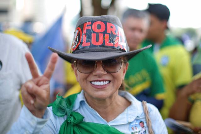 A supporter of Brazilian right-wing presidential candidate Flavio Bolsonaro attends a campaign rally in Goiania, Brazil, on September 27, 2026. Brazil will hold presidential election on October 4, 2026. (Photo by Sergio Lima / AFP)