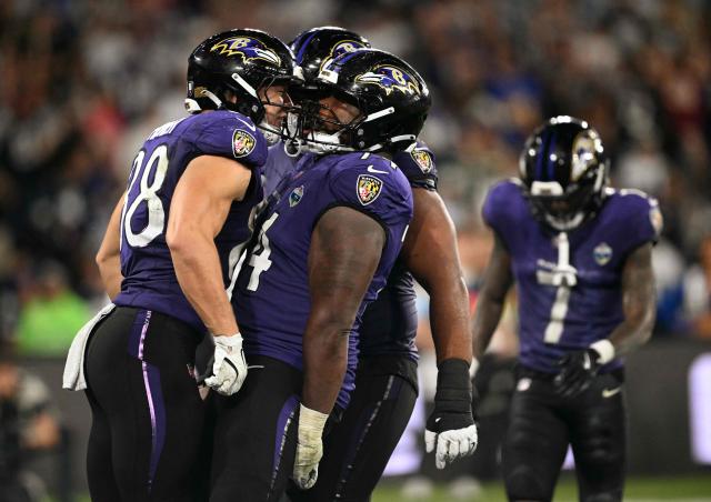 Dallas Cowboys players celebrate during the NFL match between the Dallas Cowboys and the Baltimore Ravens at the Maracana Stadium in Rio de Janeiro, Brazil, on September 27, 2026. (Photo by MAURO PIMENTEL / AFP)