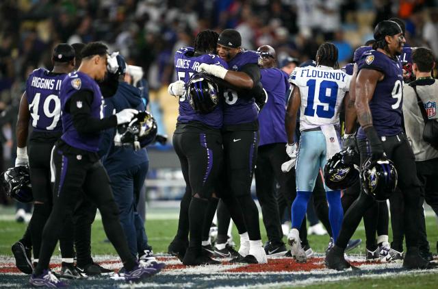 Dallas Cowboys players celebrate after winning the NFL match between the Dallas Cowboys and the Baltimore Ravens at the Maracana Stadium in Rio de Janeiro, Brazil, on September 27, 2026. (Photo by MAURO PIMENTEL / AFP)