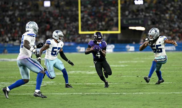 Dallas Cowboys' quarterback #04 Dak Prescott runs with the ball during the NFL match between the Dallas Cowboys and the Baltimore Ravens at the Maracana Stadium in Rio de Janeiro, Brazil, on September 27, 2026. (Photo by MAURO PIMENTEL / AFP)