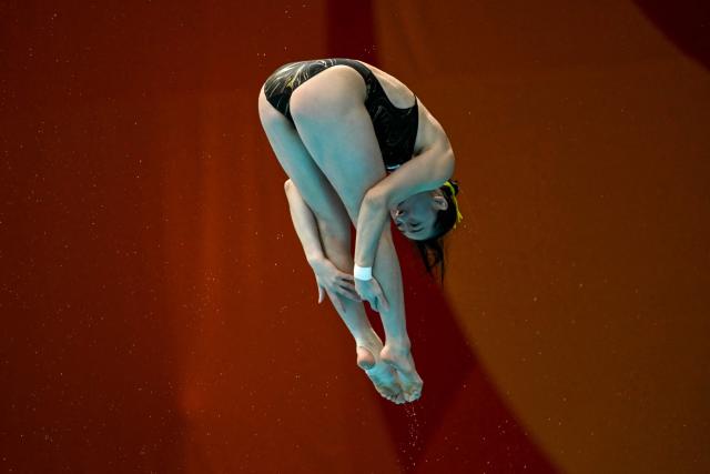 South Korea's Kim Na-hyun competes in the women's 1m springboard final diving event during the 2026 Asian Games at the Tokyo Aquatics Centre in Tokyo on September 28, 2026. (Photo by ANDREW CABALLERO-REYNOLDS / AFP)