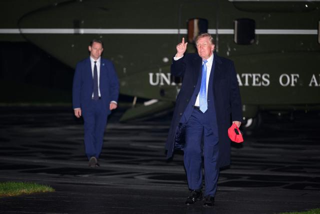 US President Donald Trump gestures as he walks across the South Lawn upon return to the White House in Washington, DC on September 27, 2026. Trump returned from Chicago where he attended the President's Cup closing ceremony. (Photo by Mandel NGAN / AFP)