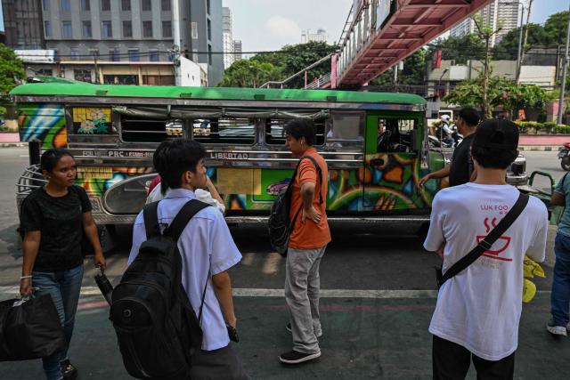 Commuters standby as they wait for jeepneys in Pasay City, Metro Manila on September 28, 2026. The Philippine Department of Transportation approved the public transport fare increase that takes effect on September 28. (Photo by Jam STA ROSA / AFP)