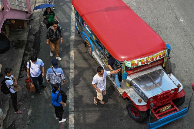 Commuters standby as they wait for jeepneys in Pasay City, Metro Manila on September 28, 2026. The Philippine Department of Transportation approved the public transport fare increase that takes effect on September 28. (Photo by Jam STA ROSA / AFP)