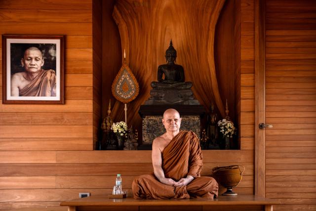 TOPSHOT - British and Thai Buddhist monk Shaun Chiverton, now known as Ajahn Jayasaro, poses after an interview with AFP in Bangkok on September 1, 2026. From a working-class childhood on the southern English coast to the top foreign-born monk in Thailand, Chiverton's quest for a better life has taken him further than most. Five decades after he travelled to India to follow the Buddha's teachings, the 68-year-old this summer became the first non-Thai to be elevated to rank of Somdet Phra Rachakhana, or royal monastic leader -- the second-highest level in Thailand's monkhood. (Photo by Chanakarn LAOSARAKHAM / AFP) / TO GO WITH AFP STORY: Thailand-Britain-religion, by Thanaporn PROMYAMYAI and Eden EZRA