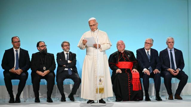 Pope Leo XIV (C)delivers a speech in front of (From L) the president of France's protestant federation Christian Krieger, Metropolis of France and the Ecumenical Patriarchate representative Dimitrios Ploumis, Chief Rabbi of France Haim Korsia, French archbishop Jean-Marc Aveline, Franco-Algerian lawyer and Rector of Paris' Grand Mosque Chems-eddine Hafiz and co-chair of the Buddhist Union of France Antony Boussemart during an interfaith meeting at the Robert Schuman Conference Centre in Metz northeastern France on September 28, 2026 on the last day of his visit to France. (Photo by Alberto PIZZOLI / AFP)