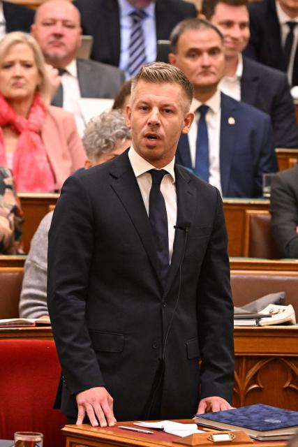 Hungarian Prime minister Peter Magyar speaks at the Hungarian parliament in Budapest on September 28, 2026, as the Parliament lifted his parliamentary immunity, allowing criminal proceedings against him. Magyar is being probed for theft over a 2024 incident, where prosecutors allege he snatched a phone from a man filming him in a nightclub and threw it into the river Danube. He has called for his immunity to be lifted in the case he has long described as a "sham". (Photo by Attila KISBENEDEK / AFP)