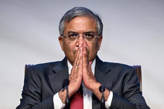 (FILES) Gyanesh Kumar, Chief Election Commissioner (CEC) of India, gestures as he addresses a press conference in New Delhi on August 17, 2025. The Election Commission of India, long regarded as the guardian of the world's largest democracy, is facing scrutiny after a newspaper investigation alleged impropriety during a large-scale voter-roll revision. (Photo by Sajjad HUSSAIN / AFP)