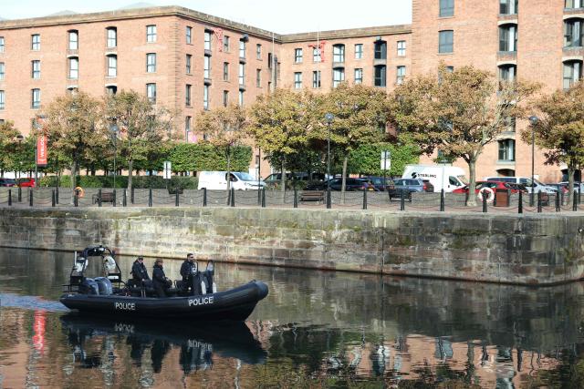 Police patrol by boat around the venue, on the second day of the annual Labour Party conference in Liverpool, north-west England, on September 28, 2026. (Photo by Darren Staples / AFP)