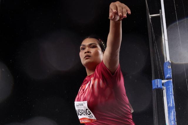 Thailand's Subenrat Insaeng competes in the women's discus throw final during the 2026 Asian Games at Nagoya City Mizuho Park Athletic Stadium in Nagoya, Aichi Prefecture on September 28, 2026. (Photo by David GRAY / AFP)