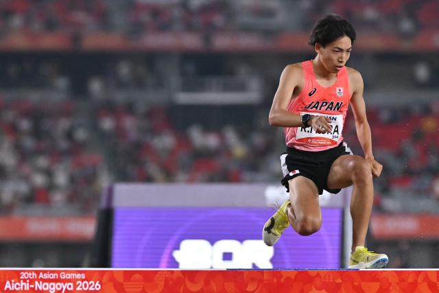 Japan's Ryuji Miura competes in the men's 3000m steeplechase final during the 2026 Asian Games at Nagoya City Mizuho Park Athletic Stadium in Nagoya, Aichi Prefecture on September 28, 2026. (Photo by MOHD RASFAN / AFP)
