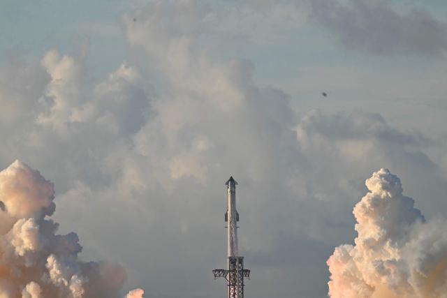 SpaceX Starship Flight 14 launches at SpaceX Starbase in Starbase, Texas on September 28, 2026. Flight 14 is planned to be the first to send Starship into orbit around the Earth as well as deploy Starlink satellites. (Photo by RONALDO SCHEMIDT / AFP)