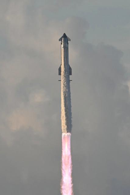 SpaceX Starship Flight 14 launches at SpaceX Starbase in Starbase, Texas on September 28, 2026. Flight 14 is planned to be the first to send Starship into orbit around the Earth as well as deploy Starlink satellites. (Photo by RONALDO SCHEMIDT / AFP)