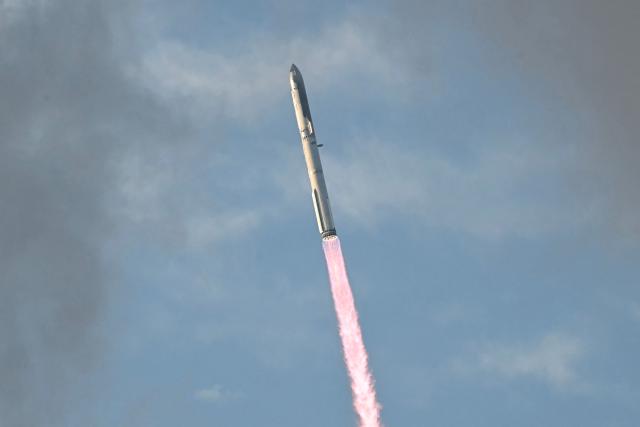 SpaceX Starship Flight 14 launches at SpaceX Starbase in Starbase, Texas on September 28, 2026. Flight 14 is planned to be the first to send Starship into orbit around the Earth as well as deploy Starlink satellites. (Photo by RONALDO SCHEMIDT / AFP)