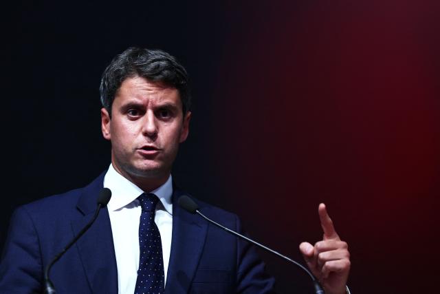 Centre-right party Renaissance candidate in France's 2027 presidential election Gabriel Attal takes part in "Le Grand Oral" of the Paris Builders Show, in which candidates in France's 2027 presidential election present their proposals for the construction and housing sector, during the Batimat trade show at the Porte de Versailles exhibition centre in Paris, on September 28, 2026. (Photo by Anne-Christine POUJOULAT / AFP)