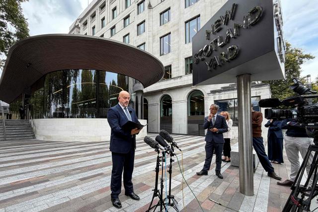 Assistant Commissioner Laurence Taylor (L), head of Counter Terrorism Policing, speaks to the media outside the New Scotland Yard in London on September 28, 2026. British police said on September 28 five men arrested near an airbase used by the United States were being released on bail, as officers probed whether a "foreign state" could be involved in a suspected bomb plot targeting it. (Photo by Jessica HOWARD-JOHNSTON / AFP)