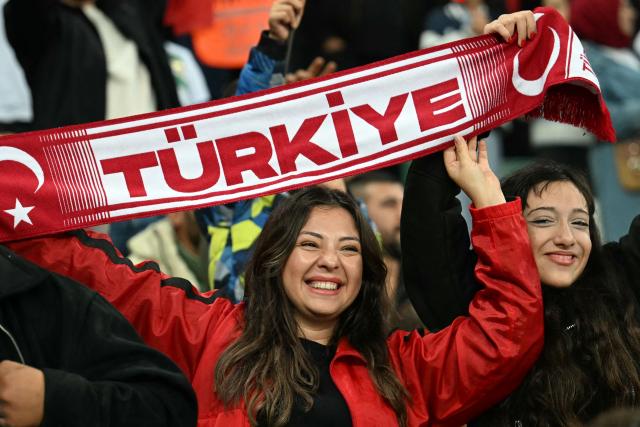 Turkish supporters cheer on their team ahead of the UEFA Nations League football match (League A, Group A1)  between Turkey and Italy at the Ataturk Sports Complex Matl? Stadium in Bursa on September 28, 2026. (Photo by Ozan KOSE / AFP)
