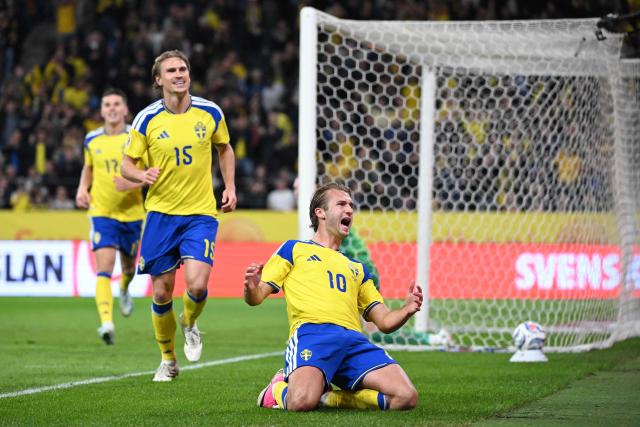 Sweden's forward #10 Benjamin Nygren (R) celebrates scoring the opening goal with his teammates during the UEFA Nations League Group B4 between Sweden and Poland at the Strawberry Arena in Solna on September 28, 2026. (Photo by Jonathan Nackstrand / AFP)