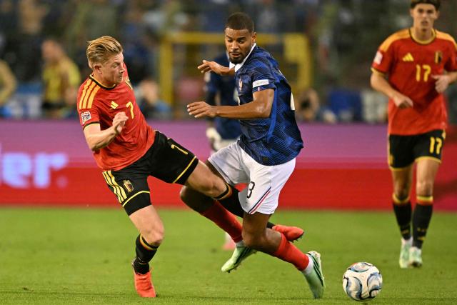 Belgium's midfielder #07 Kevin De Bruyne (L) fights for the ball with France's midfielder #13 Andy Diouf (R) during the UEFA Nations League Group A1 football match between Belgium and France at King Baudouin Stadium in Brussels on September 28, 2026. (Photo by NICOLAS TUCAT / AFP)