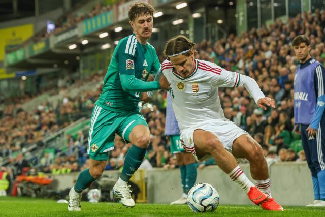 Northern Ireland's defender  #05 Trai Hume (L) vies with Hungary's defender #11 Milos Kerkez (R) during the UEFA Nations League, League B, Group 2 match between Northern Ireland and Hungary at Windsor Park in Belfast, Northern Ireland on September 28, 2026. (Photo by Paul Faith / AFP)
