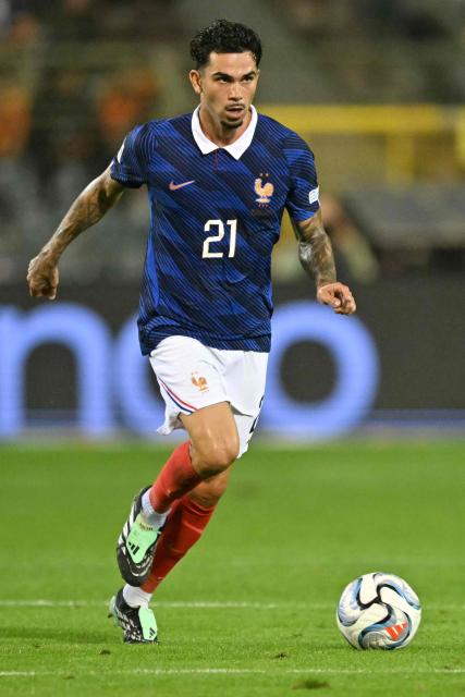 France's midfielder #21 Lucas Da Cunha runs with the ball during the UEFA Nations League Group A1 football match between Belgium and France at King Baudouin Stadium in Brussels on September 28, 2026. (Photo by NICOLAS TUCAT / AFP)