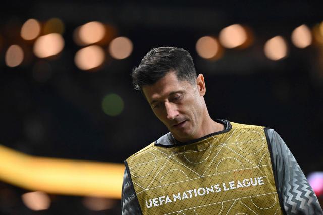 Poland's forward #09 Robert Lewandowski warms up on the sideline during the UEFA Nations League Group B4 between Sweden and Poland at the Strawberry Arena in Solna on September 28, 2026. (Photo by Jonathan Nackstrand / AFP)