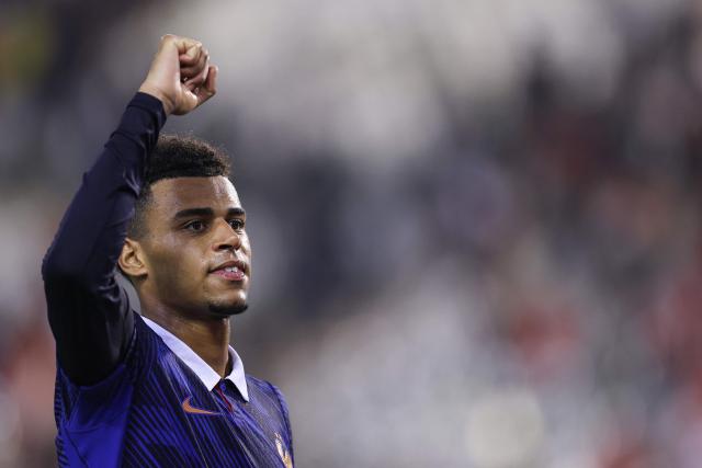 France's forward #20 Desire Doue celebrates the victory at the end of the UEFA Nations League Group A1 football match between Belgium and France at King Baudouin Stadium in Brussels on September 28, 2026. (Photo by FRANCK FIFE / AFP)