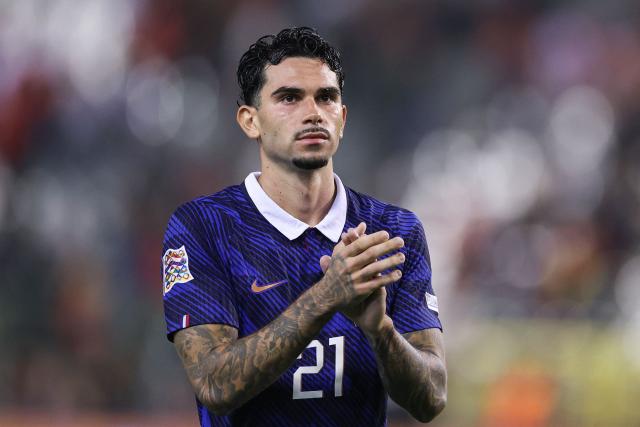 France's midfielder #21 Lucas Da Cunha applauds to celebrate the victory at the end of the UEFA Nations League Group A1 football match between Belgium and France at King Baudouin Stadium in Brussels on September 28, 2026. (Photo by FRANCK FIFE / AFP)