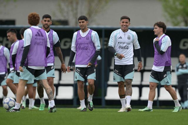 Argentina's footballers (L-R) defender Cristian Romero, midfielder Exequiel Palacios, midfielder Enzo Fernandez and forward Julian Alvarez gesture during a training session at the Argentine Football Association (AFA) training camp in Ezeiza, Buenos Aires Province, on September 28, 2026 ahead of the friendly matches against Bolivia, Burkina Faso, and Benin. (Photo by JUAN MABROMATA / AFP)