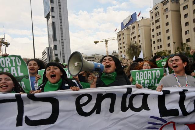 Women shout slogans during a demonstration in favor of the decriminalization of abortion on the occasion of the International Safe Abortion Day in Santiago on September 28, 2026. (Photo by RODRIGO ARANGUA / AFP)
