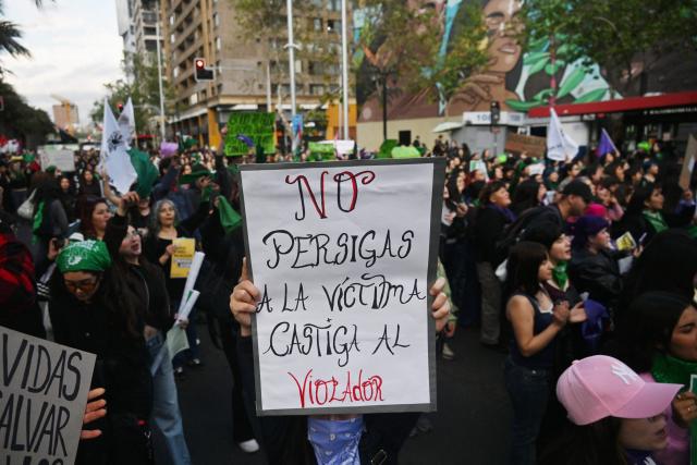 Demonstrators take part in a demonstration in favor of the decriminalization of abortion on the occasion of the International Safe Abortion Day in Santiago on September 28, 2026. (Photo by RODRIGO ARANGUA / AFP)