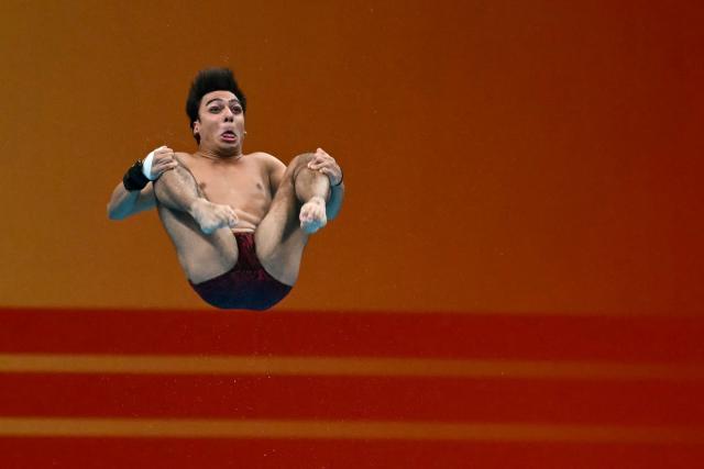 Iran's Sam Vajerhelabad competes in the men's 3m springboard preliminary diving event during the 2026 Asian Games at the Tokyo Aquatics Centre in Tokyo on September 29, 2026. (Photo by ANDREW CABALLERO-REYNOLDS / AFP)