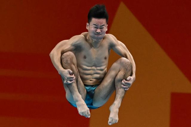 Japan's Senri Ikuma competes in the men's 3m springboard preliminary diving event during the 2026 Asian Games at the Tokyo Aquatics Centre in Tokyo on September 29, 2026. (Photo by ANDREW CABALLERO-REYNOLDS / AFP)