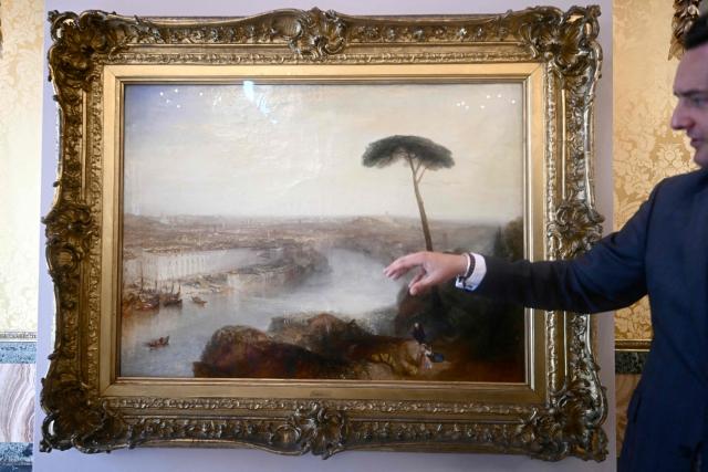 A picture shows a painting by William Turner "Rome, from Mount Aventine" painted in 1835, presented by Sotheby's auction house at Palazzo Rondinini in Rome on September 29, 2026. (Photo by Filippo MONTEFORTE / AFP)