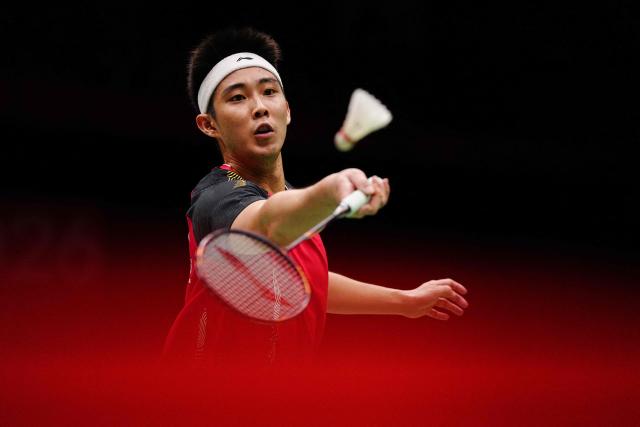 Singapore's Loh Kean Yew hits a return against Thailand's Kunlavut Vitidsarn during the men's singles badminton final during the 2026 Asian Games at the Ichinomiya City Municipal Gymnasium in Ichinomiya, Aichi prefecture on September 29, 2026. (Photo by Yuichi YAMAZAKI / AFP)