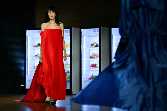 A model presents a creation during the Marie Adam-Leenaerdt Women's Spring/Summer 2027 collection fashion show as part of the Paris Fashion Week, in Paris on September 29, 2026. (Photo by LOU BENOIST / AFP)