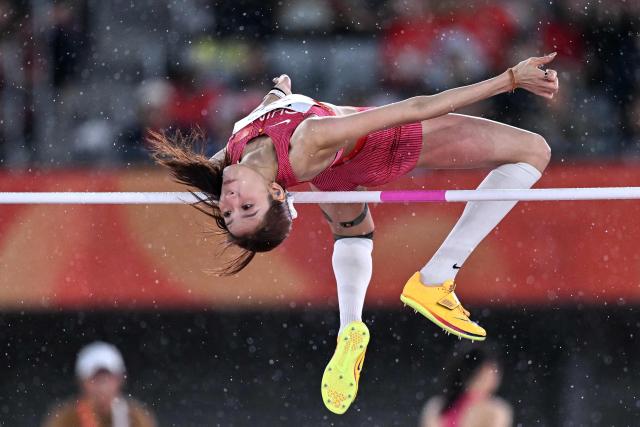 China's Lu Jiawen competes in the women's high jump final during the 2026 Asian Games at Nagoya City Mizuho Park Athletic Stadium in Nagoya, Aichi Prefecture on September 29, 2026. (Photo by MOHD RASFAN / AFP)