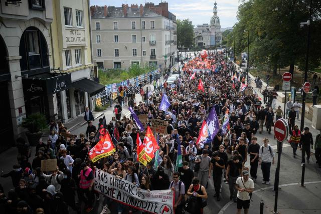 Protesters take part in a rally during a day of nationwide public sector strikes and demonstrations, in Nantes, western France, on September 29, 2026. Public sector workers, including firefighters, hold a one-day strike and demonstrations across France on September 29 in response to a call from a broad inter-union coalition, with the aim of putting pressure on the government two days before the presentation of the draft budget for 2027. (Photo by Loic VENANCE / AFP)